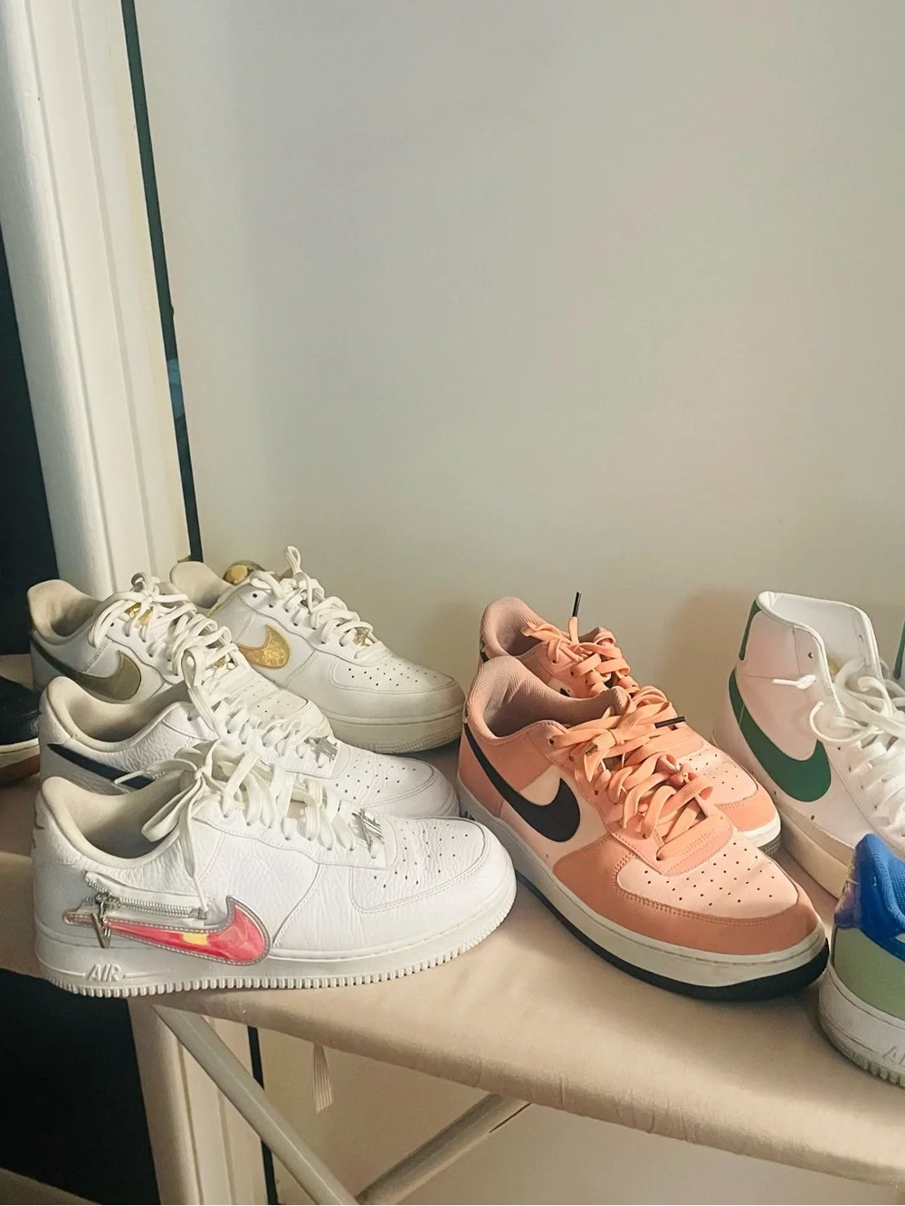 Nike Kids White Sneakers with Gold Swoosh